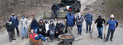 Photo of 4imprint team members volunteer at nearby Heckrodt Nature Preserve