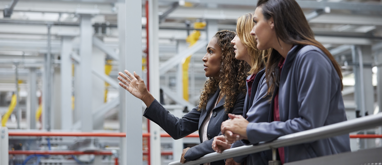 Women discussing manufacturing